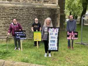 Participants with their placards